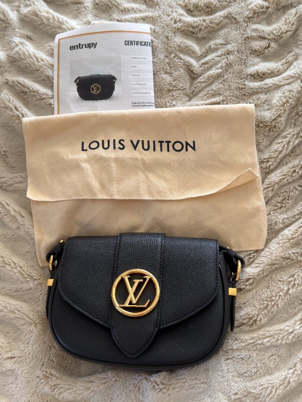 Louis Vuitton Pont 9 Soft PM in black grained calfskin
